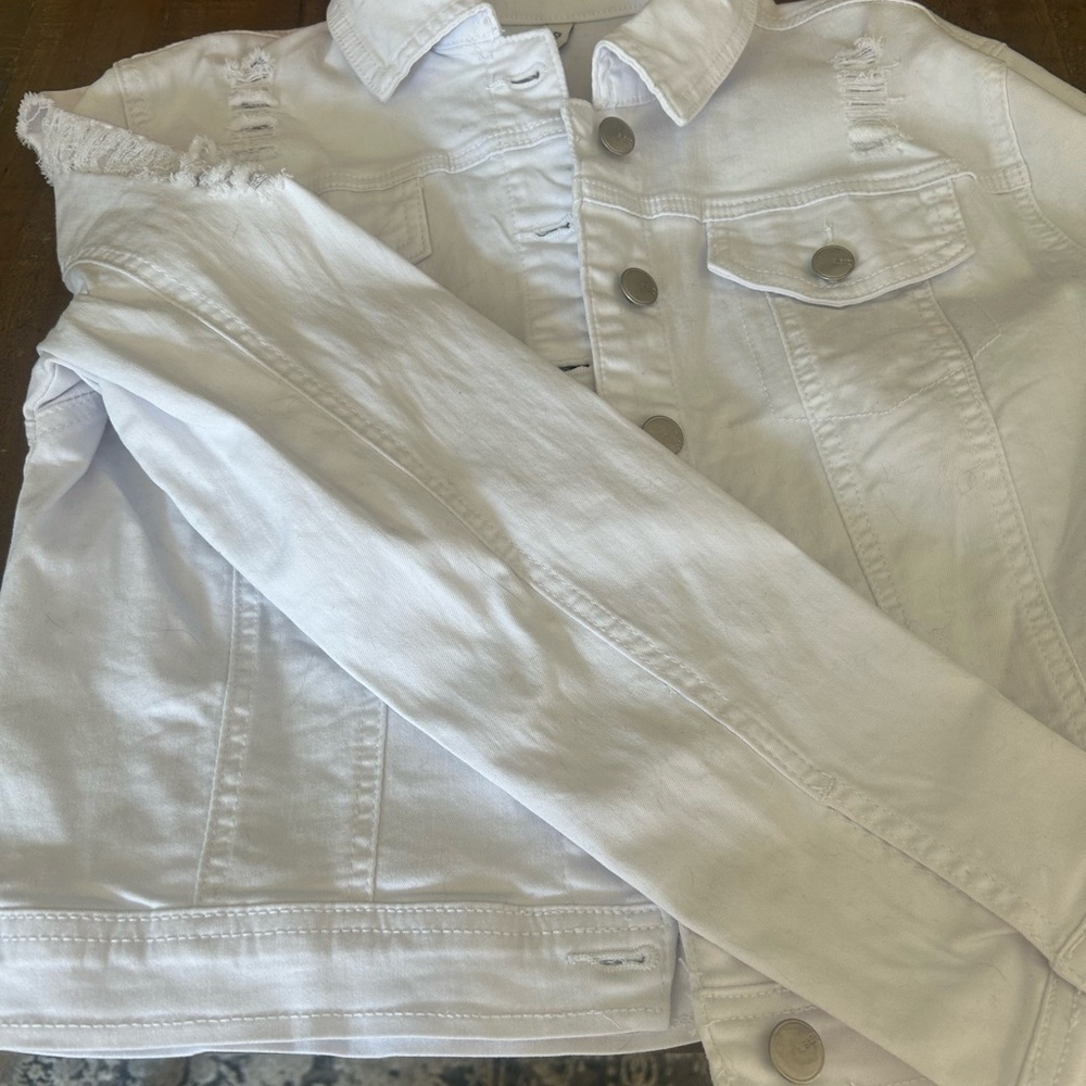Distressed white jacket.